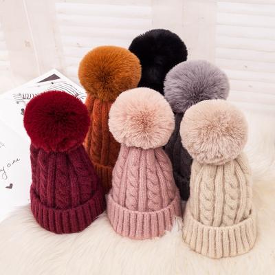 China JOINT Hot Sale Velvet Winter Hat Cap Women Knitting Hat Faux Fur Beanie Hat Pompoms for sale