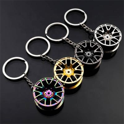 China Hot Selling Custom Car Metal Wheel Hub Shape Metal Auto Key Chain for sale