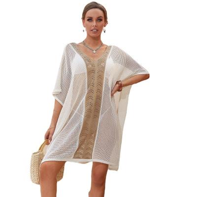 China New Anti-UV summer style beach cover ups hollow out translucent design blouse polyester fiber beach sexy skirt for sale