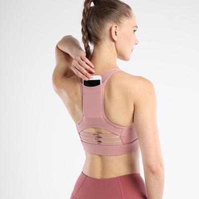 China High quality new design antibacterial gym wear sports pink bra with phone pockets for sale