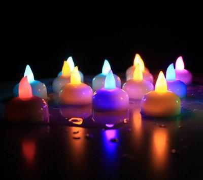 China COLOR CHANGING battery operated led mini candles flicker led colors changeable tealight for sale