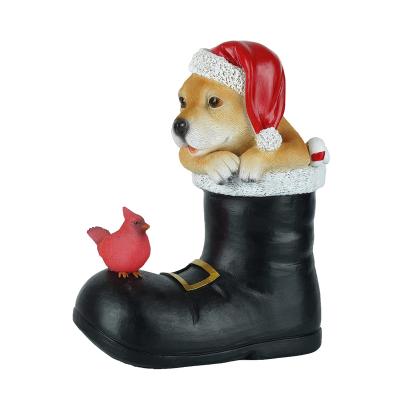 China Europe Resin Holiday Christmas Decoration Dog In Shoes Sculpt Lawn Patio Decor for sale