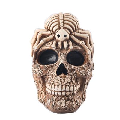 China Europe Vintage Spider Skull Model Resin Floral Human Skull Head Figurines for sale