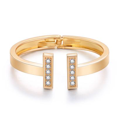 China New Trendy Design Alloy Gold Plated Diamond T Letter Cuff Bangle Bracelet For Woman for sale