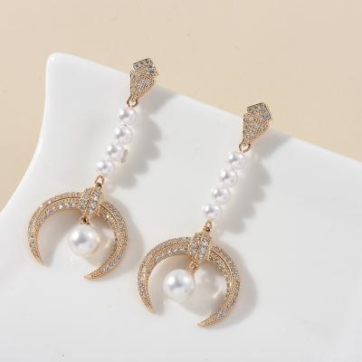 China FASHIONABLE Gold Plated Zircon Crescent Moon Pendant Earrings Pearl Chain Hanging Earrings For Party for sale