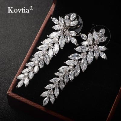 China TRENDY Design Top Fashion Long Style Leaf Earrings Zircon Stud Tassel Earrings Jewelry for sale