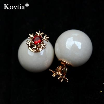 China Cute Ruby Zircon Earrings Dainty Pearl Stud Earrings New Design Women Pearl Stud Earrings for sale