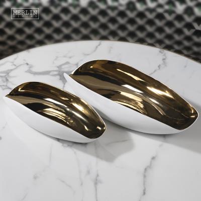 China Minimalist Gold White Ceramic Luxury Decorative Dishes Bowl Fruit Shape Boat Middle East Decor Modern Home Accessories for sale