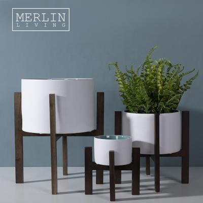 China Merlin Interior Small Modern Flower Pots Planter Bulk Cheap Sale With Wooden Stand Ceramic Plants Garden Flower Pot For Flower Pots for sale