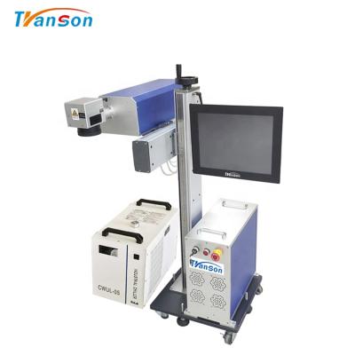 China High Speed 3W 5W UV Flying Laser Marking Machine For Plastic PVC Bags Bottle Metal Production Line for sale