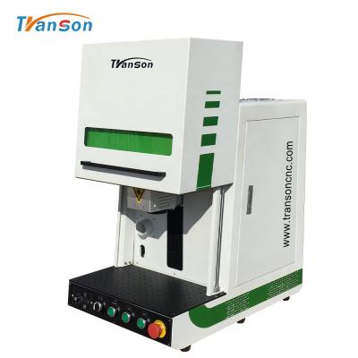 China 30W desktop fiber laser marking machine enclosed galvo laser machine for engraving stainless steel and aluminum à venda