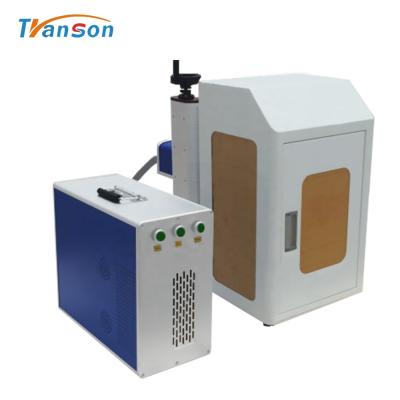 Cina Enclosed Door CNC Metal Fiber Laser Marker Marking Machine Price With Air Filter in vendita