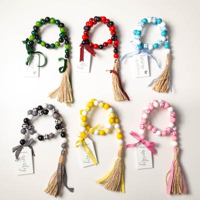 China 100% handmade grid bead wooden garlands with tags for christmas decoration for sale