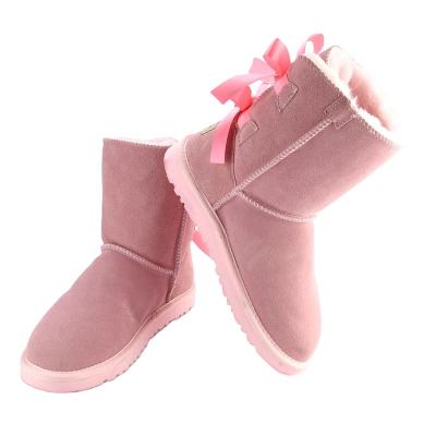 China Fashion trend factory products wholesale xdxugg boots for women snow boots with two bows boot for sale