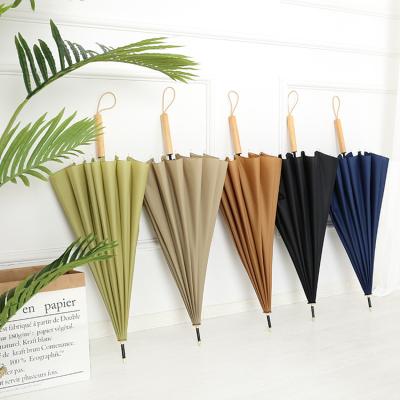 China Retro Plain Straight Color 8K Wooden Pole Curved Handle Umbrella Creative Wooden Umbrella Umbrella for sale