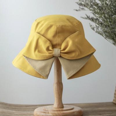 China Adult Unisex Plush Customized Spring And Casual Summer Split Back Bow Bucket Hat for sale