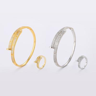 China JH FASHIONABLE Tasty Bridal Brass Jewelry Sets Aaaaa Standard White Zircon Bracelet Unique Design 18K Gold Plated Rings Set For Women for sale