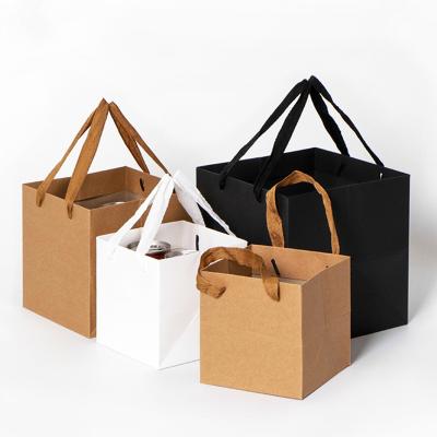 China Large Recyclable Custom Logo Black Cake Carry Bag Square Paper Bag With Handle for sale