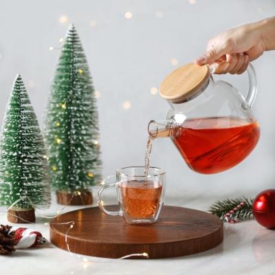 China CnGlass Hot Sale Glass Teapot wholesale  600ml Glass Kettle With Warmer Borosilicate Tea Pot Set Glass Pitcher With Bamboo Lid for sale