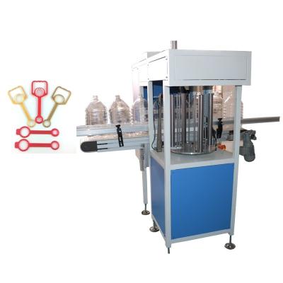 China Automatic Bottle Oil Convenience Pet Neck Grip Applicator High Speed ​​Pressing Machine for sale