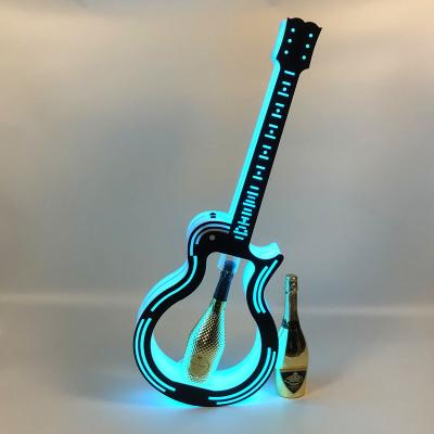 China Viable Fashionable Guitar Shape Glowing Nightclub Bottle Presenter In Reasonable Price for sale