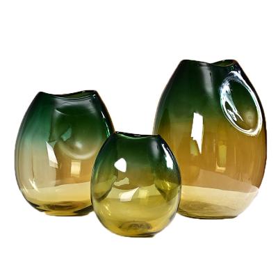 China Modern Modern design unique shaped green yellow color gradient home decoration hand blown crystal glass vase for sale