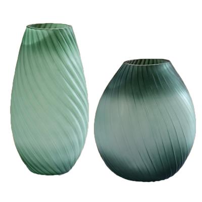 China Minimalist Green Spiral Corrugated Glass Oval Vase Living Room Flower Arrangement Creative Frosted Texture Creative Table Flower Vase for sale