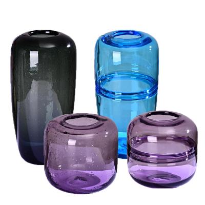 China Art Deco Creative Glass Round Hydroponic Water Flower Plants Cylinder Home Decor Helloween Living Room Simple Glass Transparent Vas for sale