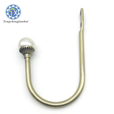 China Wholesale Healthcare Curtain Accessories Iron Flower Curtain Wall Hook for sale