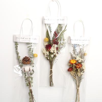 China 2021 New Design Flower+gift bag+LED Light Gift Flower Dried Flower Wrapping Bouquet For Sale for sale