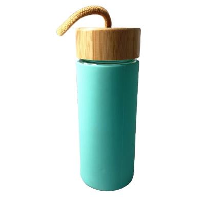 China WITH LID Hot Selling 450ml Sports Glass Water Bottle With Lid Silicone Bamboo Sleeve for sale