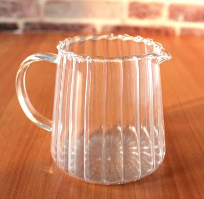 China Viable Newcomer 600ML Borosilicate Glass Handcrafted Water Jug With Bands for sale