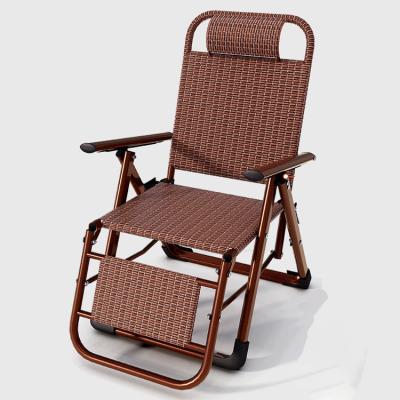 China Outdoor Beach Balcony Garden Portable Rattan Folding Sun Lounge Chair with Foot Pedal for sale