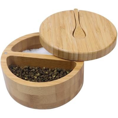 China Sustainable bamboo nordic style two-in-one round spice box kitchen acacia spice jar bottle with spoon for sale