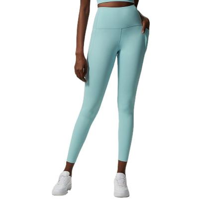 China 2022 New Yoga Pocket Sport Pants Breathable Nine-Minute Edge Fitness Anti-rolling Tight Pants for sale