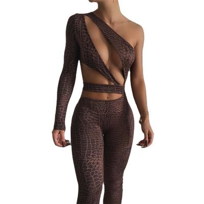 China 2022 new arrivals fashion wholesale sexy QUICK DRY snake print one shoulder cutout sports hollow out causal club bodycon jumpsuits women for sale