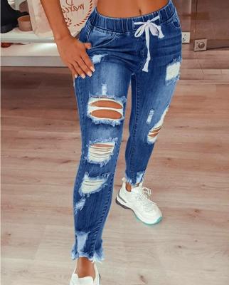 China Summer blue QUICK DRY hot sale fashionable jeans women pencil ripped jeans style women's pants jeans in 2021 for sale