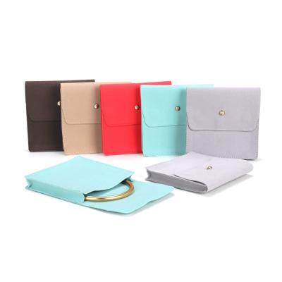 China Jewelry Bag Microfiber Leather Jewelry Pouch With Ribbon Envelope Gift Packaging Bag For Ring Earrings for sale