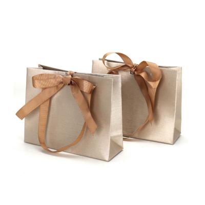 China Recyclable Biodegradable Custom Paper Shopping Bag Packaging Luxury Paper Gift Bags With Your Logo for sale