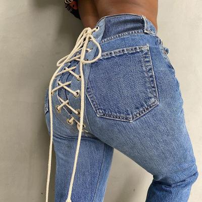 China Fashion Breathable Jeans Women Denim Pants High Waisted Stretch Fit Trend Contrast Bandage Creative Thin Stretch Tieback Grommet High Back Jeans for sale