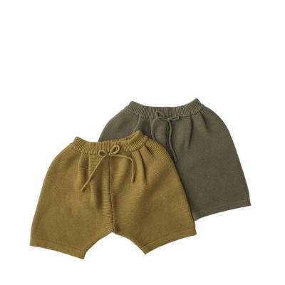 China Anti-pilling close up dark skin children's winter clothing lace-up boys and girls shorts kids pants for sale