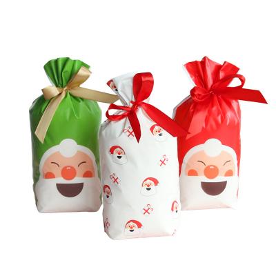 China Hot Sale 50pcs Recyclable Custom Hot Sale Wedding Party Candy Cookies Gift Plastic Drawstring Bags With Logo Christmas Gift Bag for sale