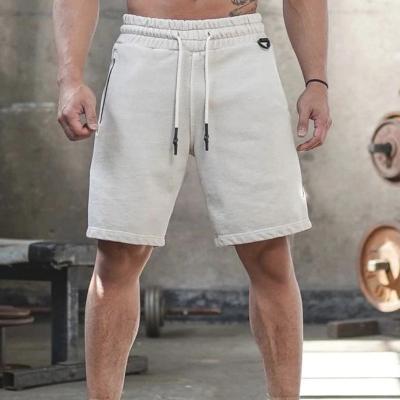 China 100% Cotton Anti-Wrinkle Gym Sweat Shorts Custom Logo Print Nylon Mesh Sports Running Shorts Men for sale