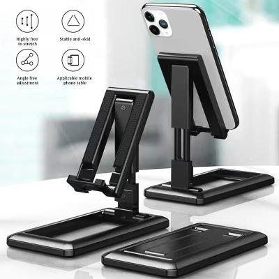 China Tablet Adjustable Foldable Adjustable Cell Phone Desk Stand Holder for iPad iPhone Samsung Mobile Phone for sale