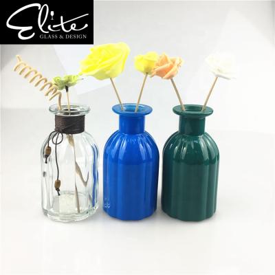 China Modern Empty Reed Diffuser Bottle With Rattan Glass Stick Essential Oil Bottle Of Personal Care Vase Decoration 130ml Beautiful for sale