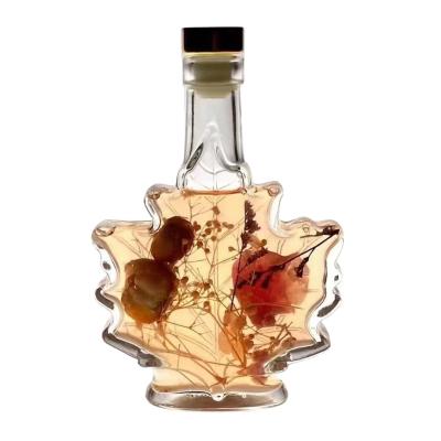 China Personal Care Hot Sales Unique Maple Leaf Diffuser Bottles Luxury Glass Perfumes Bottles for sale