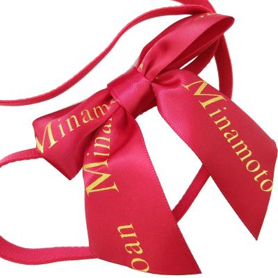 China Elegant Custom Pre Made Satin Ribbon Bow With Elastic Loop For Gift Wrapping for sale