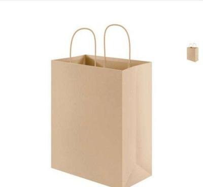 China Packing In Stock Chinese Wholesale Brown Craft Kraft Paper Gift Packaging Bags With Handle For Jewelry Shopping Garment for sale