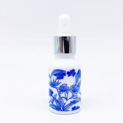 China White Personal Care Wholesale Porcelain Dropper Essential Oil Bottle With Silver Flower Basket Lid for sale