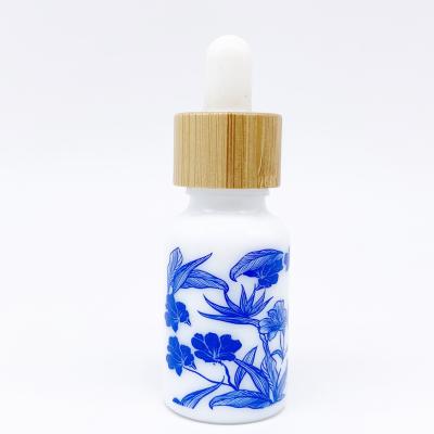 China Personal care wholesale china dropper essential oil white bottle 30ml 50ml 100ml with bamboo lid for sale